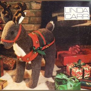 Vogue Christmas Reindeer and Hobbyhorse Santa Stockings Linda Carr Uncut V7601